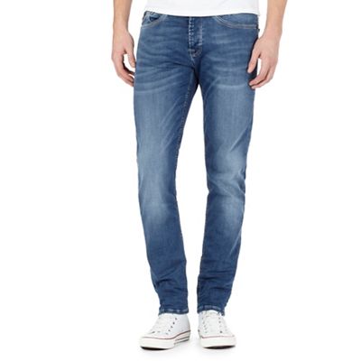 Blue tapered jeans